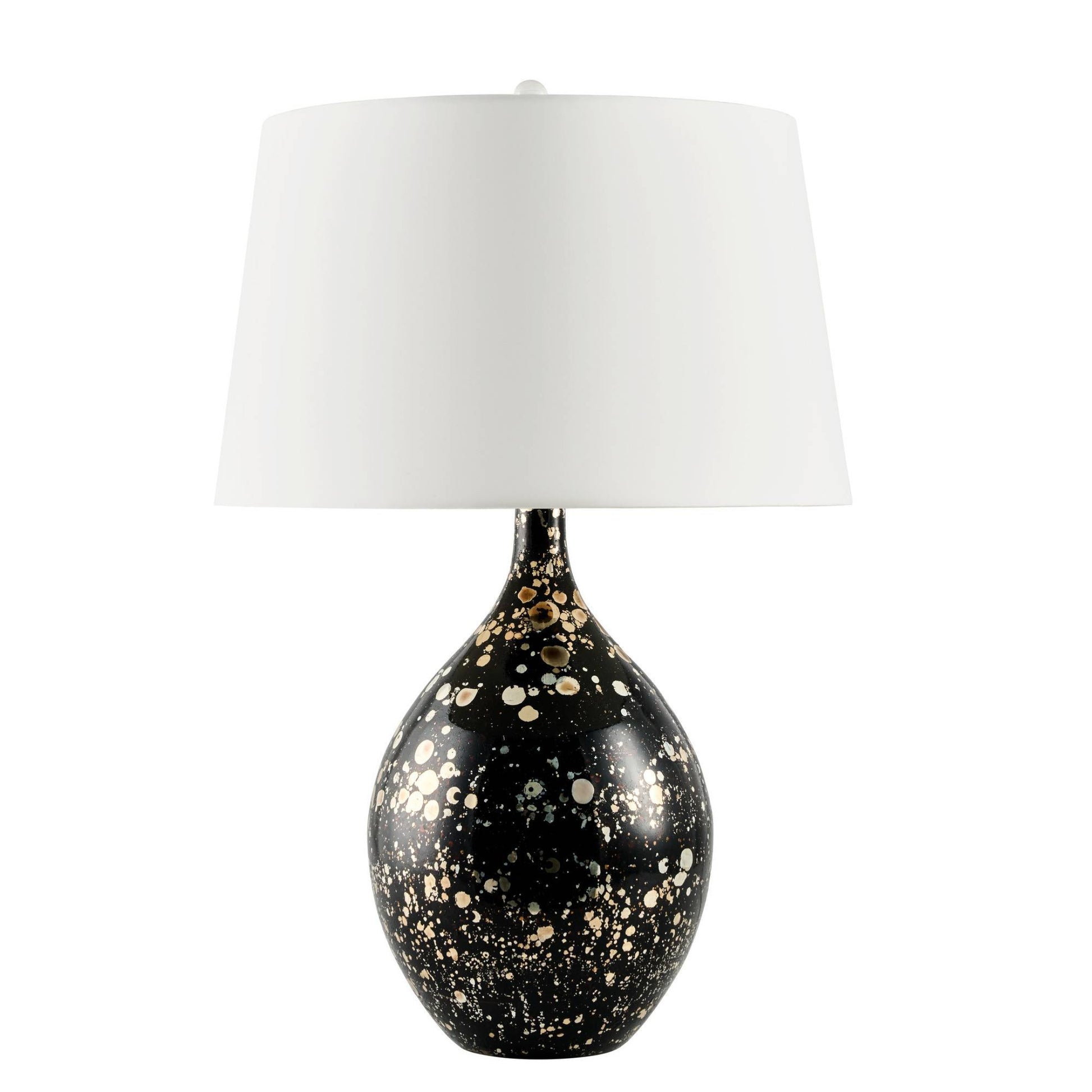 Table lamp with black base featuring gold speckles and white shade on a white background