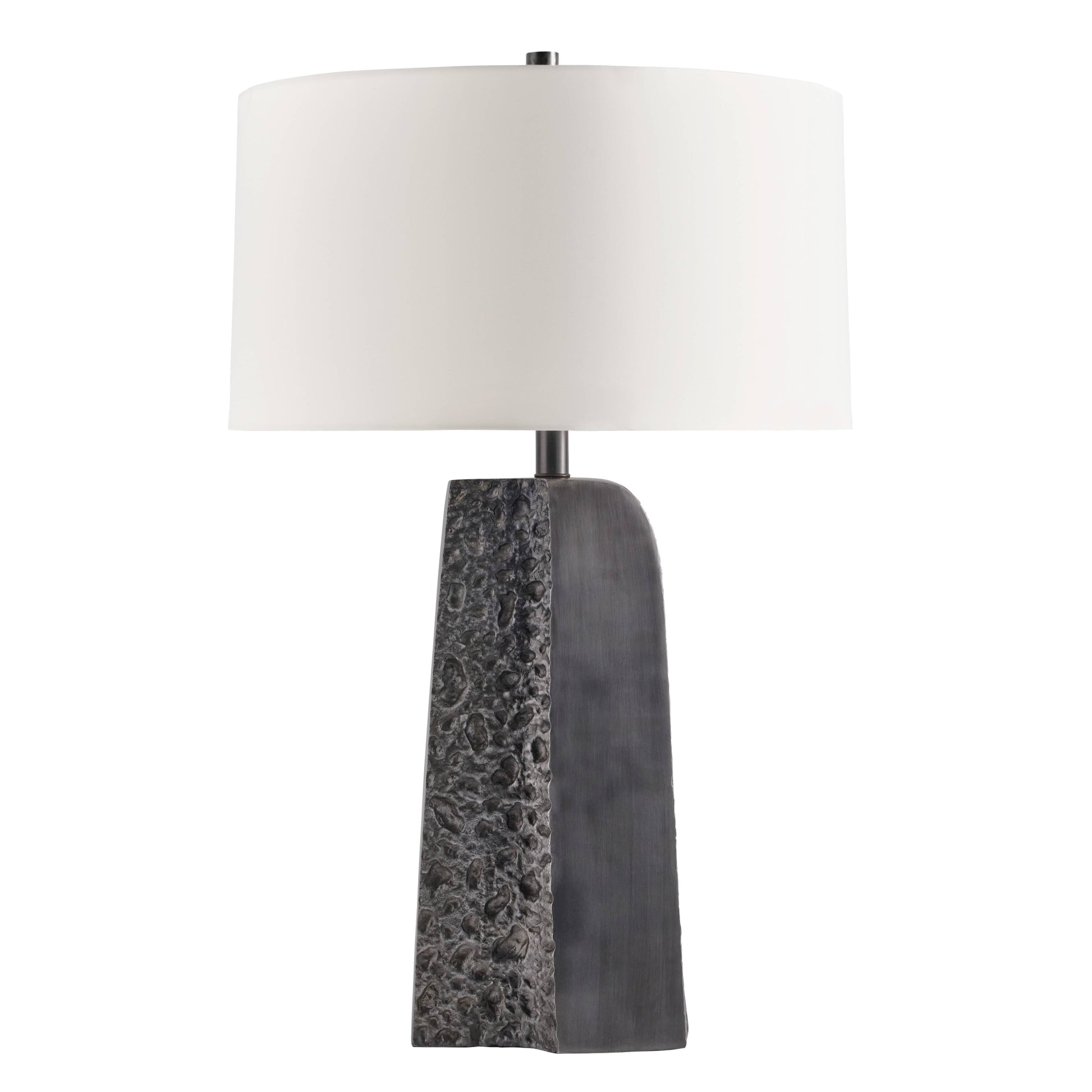 Table lamp with a textured gray base and white shade on a white background