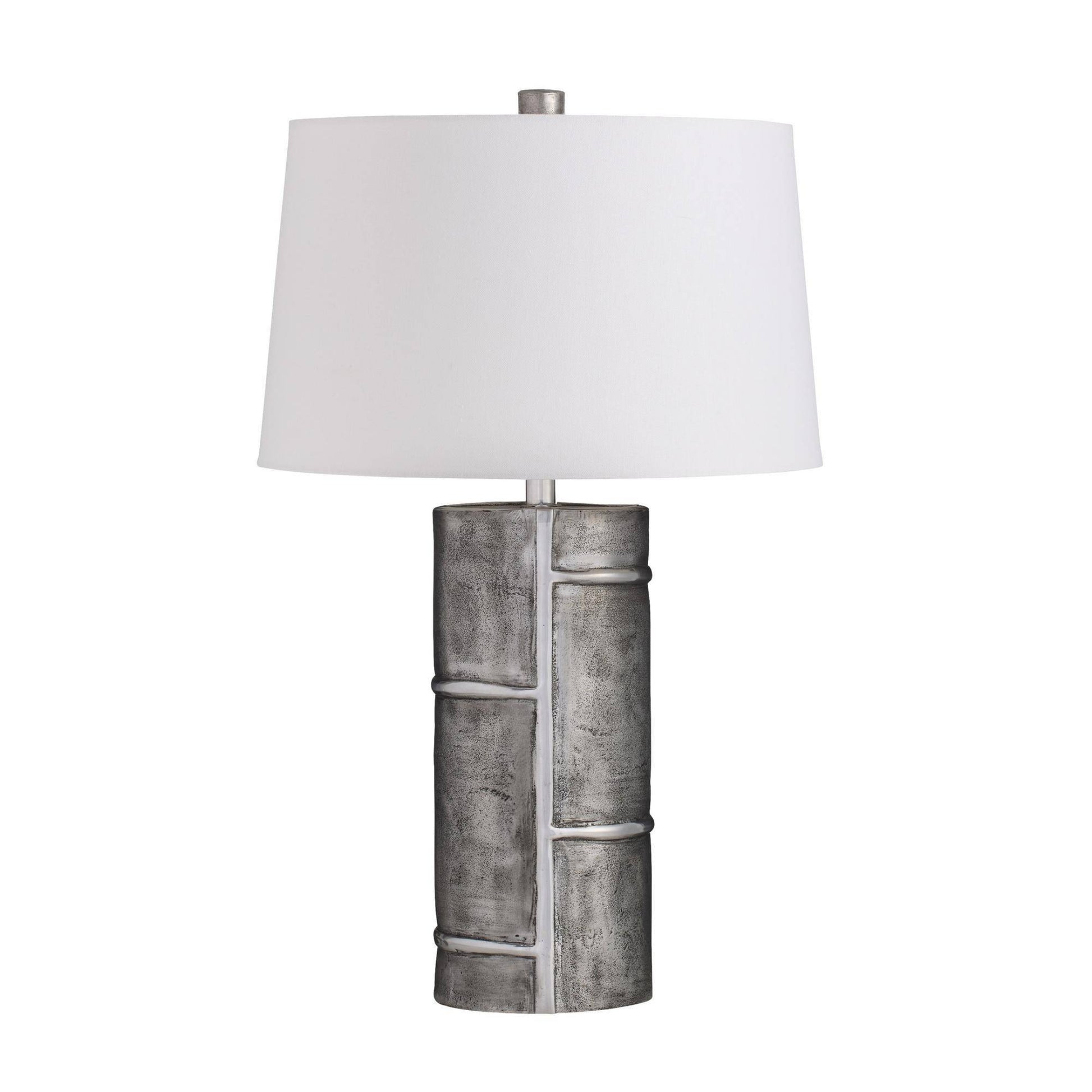 Table lamp with a textured gray base and white shade on a white background