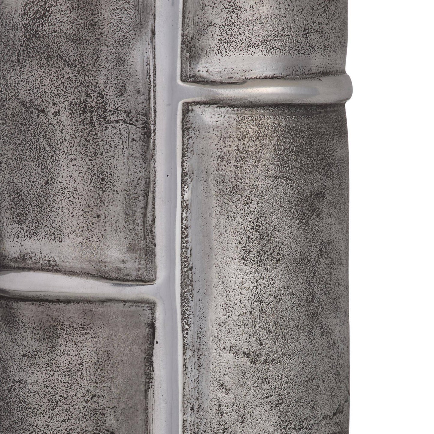Close-up of textured metal pipes on a white background