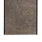 Close-up of a textured brown fabric with a black border