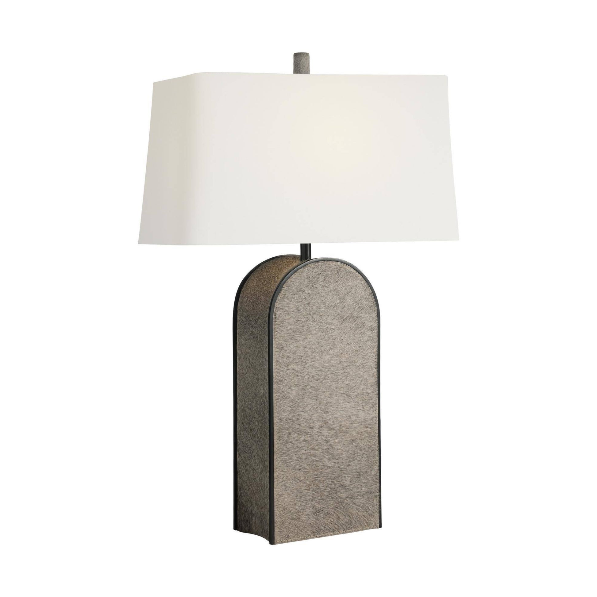 Table lamp with a textured gray base and white shade on a white background