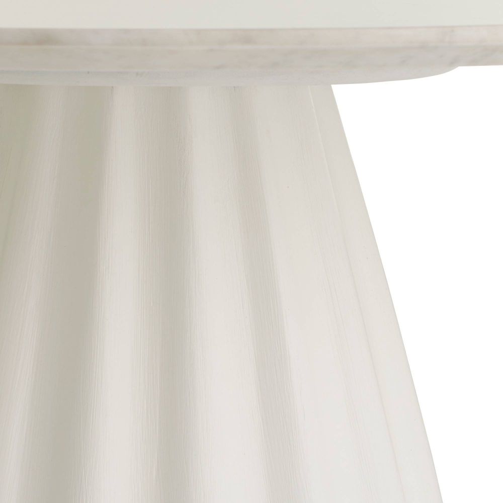 Close-up of a white curtain with folds on a plain background