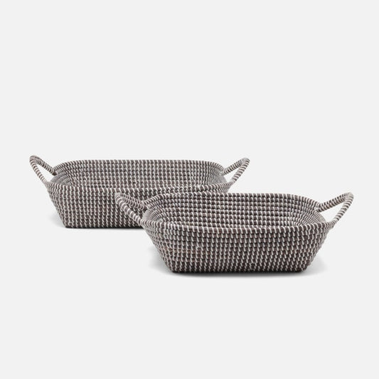 Two woven baskets on a white background
