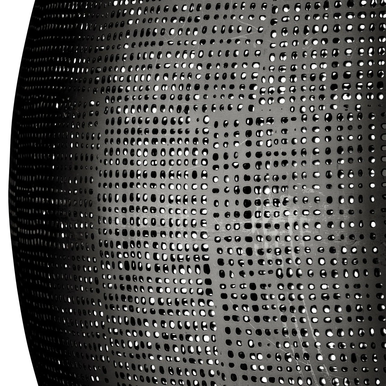 Close-up of a black textured surface with a grid pattern