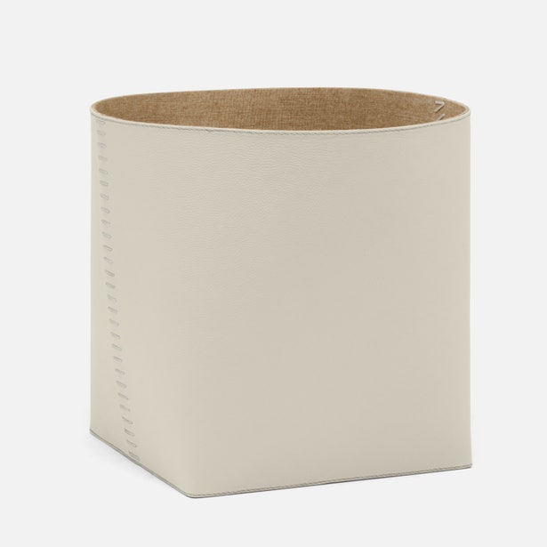 Beige rectangular storage basket with a brown interior on a white background
