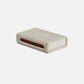 Rectangular box with textured surface and red interior on a white background