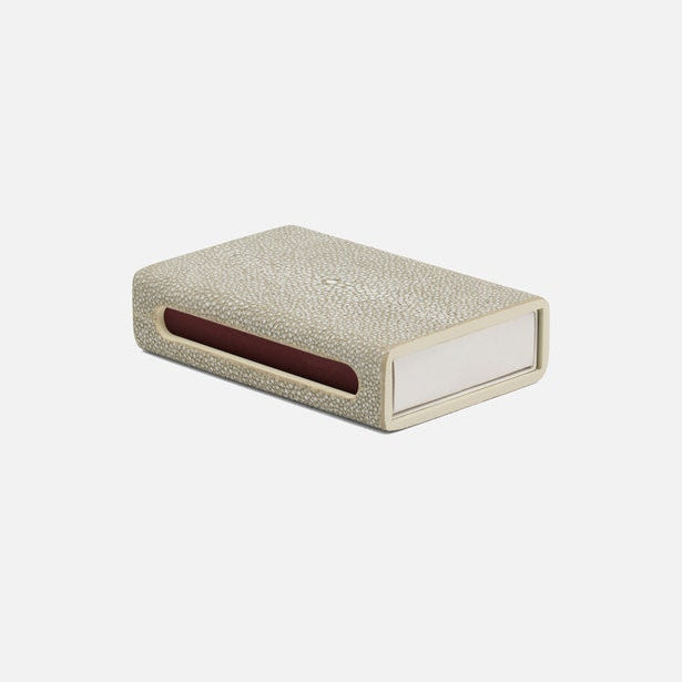 Rectangular box with textured surface and red interior on a white background