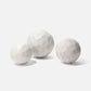 Three marble spheres on a white background