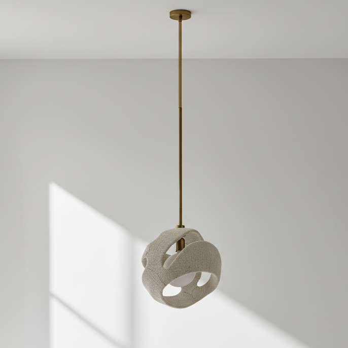 Ceiling light fixture hanging in a room with a window casting shadows on the wall.