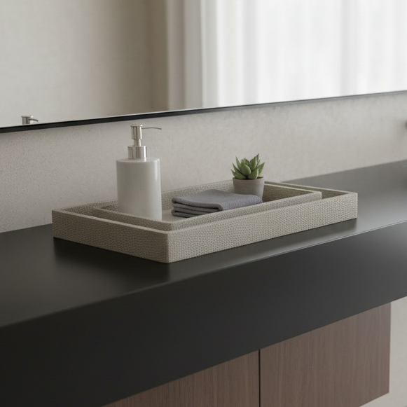 Modern bathroom vanity with black countertop and mirror