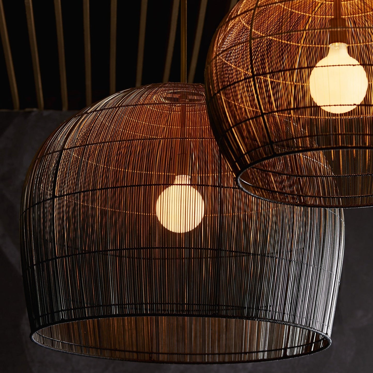 Woven pendant lights with a dark background