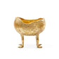 Gold decorative bowl with legs on a white background