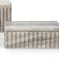 A modern rectangular box made of fluted gray stone with a matching stone top, shown on a clean white background.