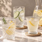clear glasses with water ice and citrus