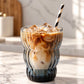 iced latte in a smoke gray glass