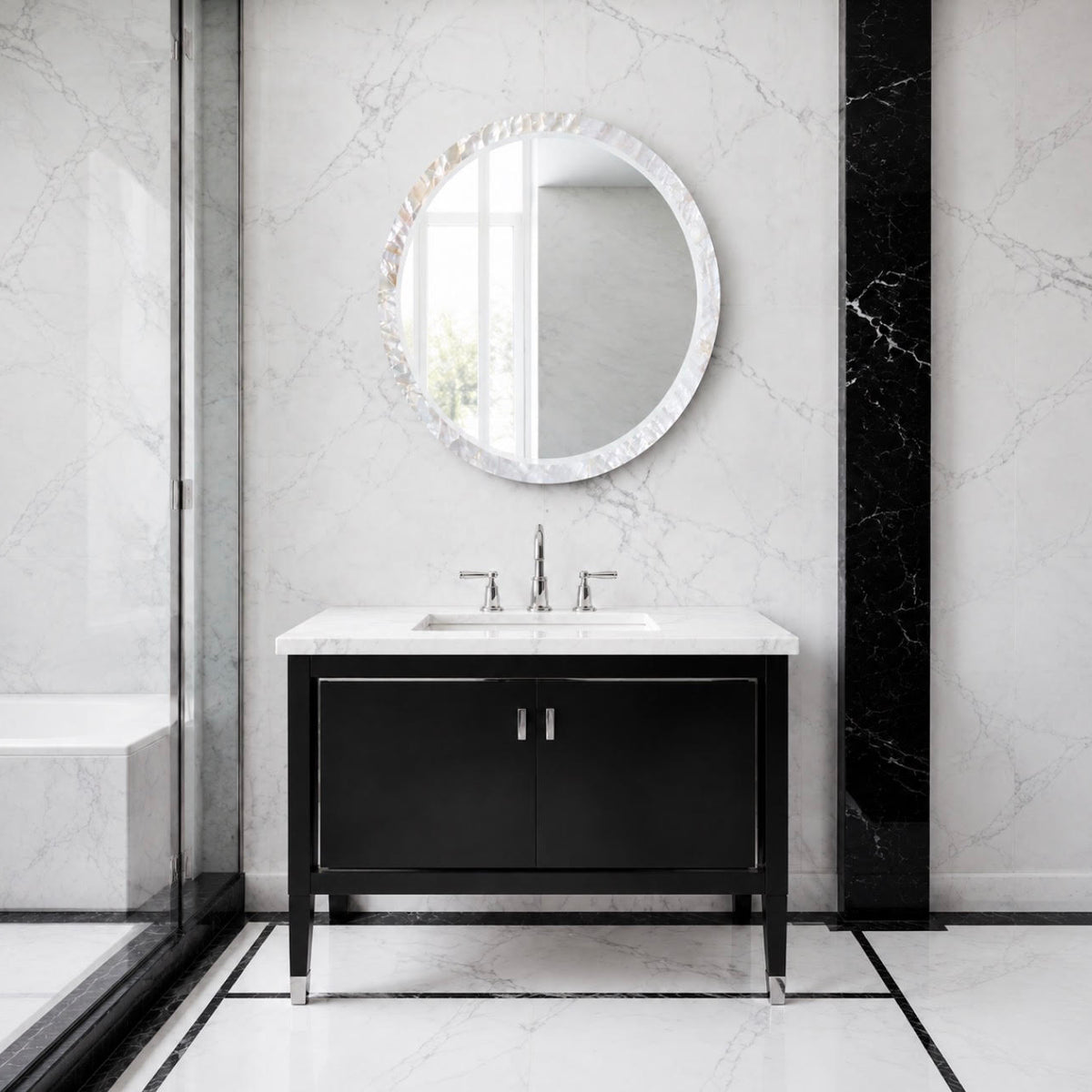 Albert kabibe shell mirror hung in a black and white bathroom