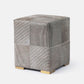 Square ottoman with a textured gray pattern on a white background