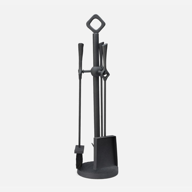 Black fireplace tool set on a white background