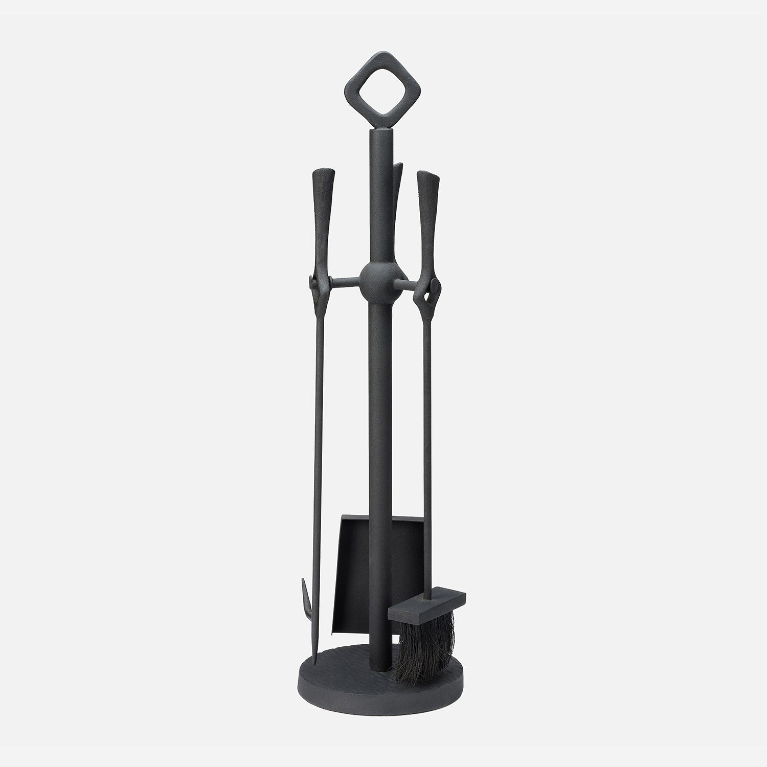 Black fireplace tool set with stand on a white background