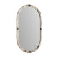 Oval mirror with decorative frame on a white background