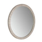 An round wall mirror with a textured, segmented frame in a light beige or off-white finish, shown against a plain white background.