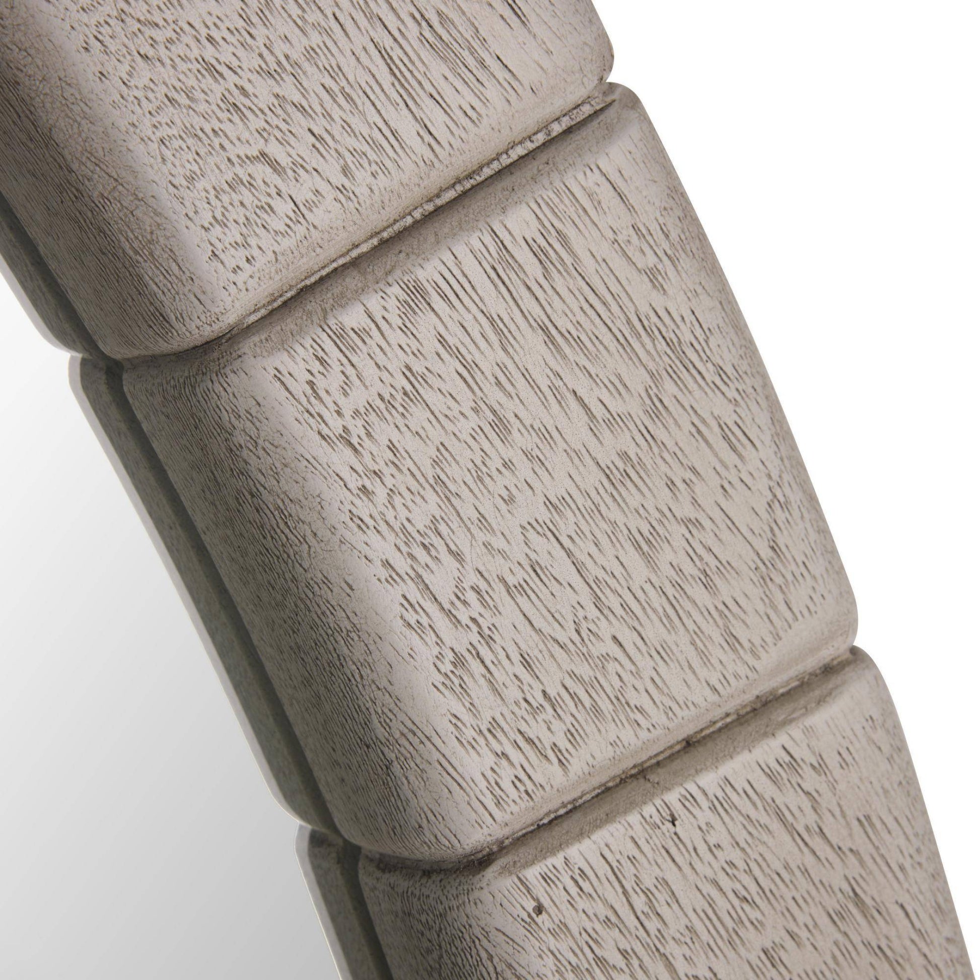 Close-up of a wooden product with a light finish on a white background