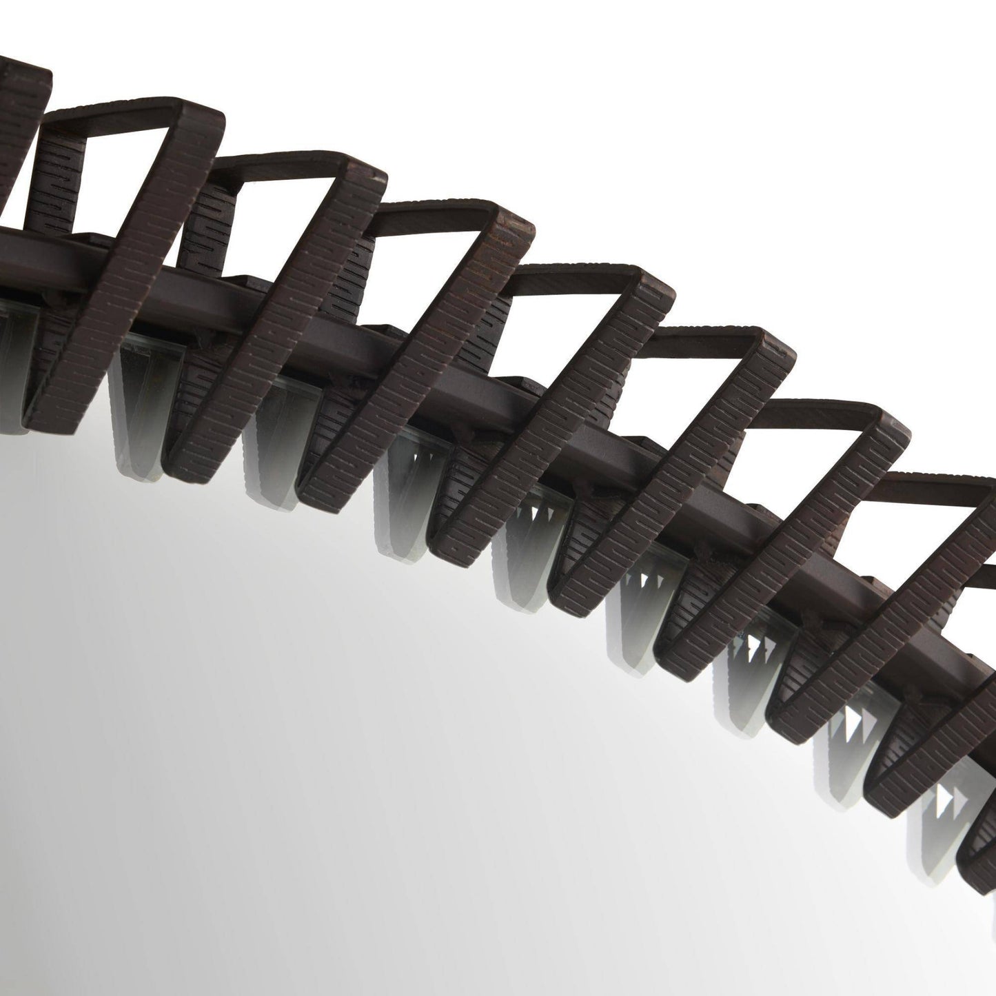 Close-up of a black spiral binding on a white background