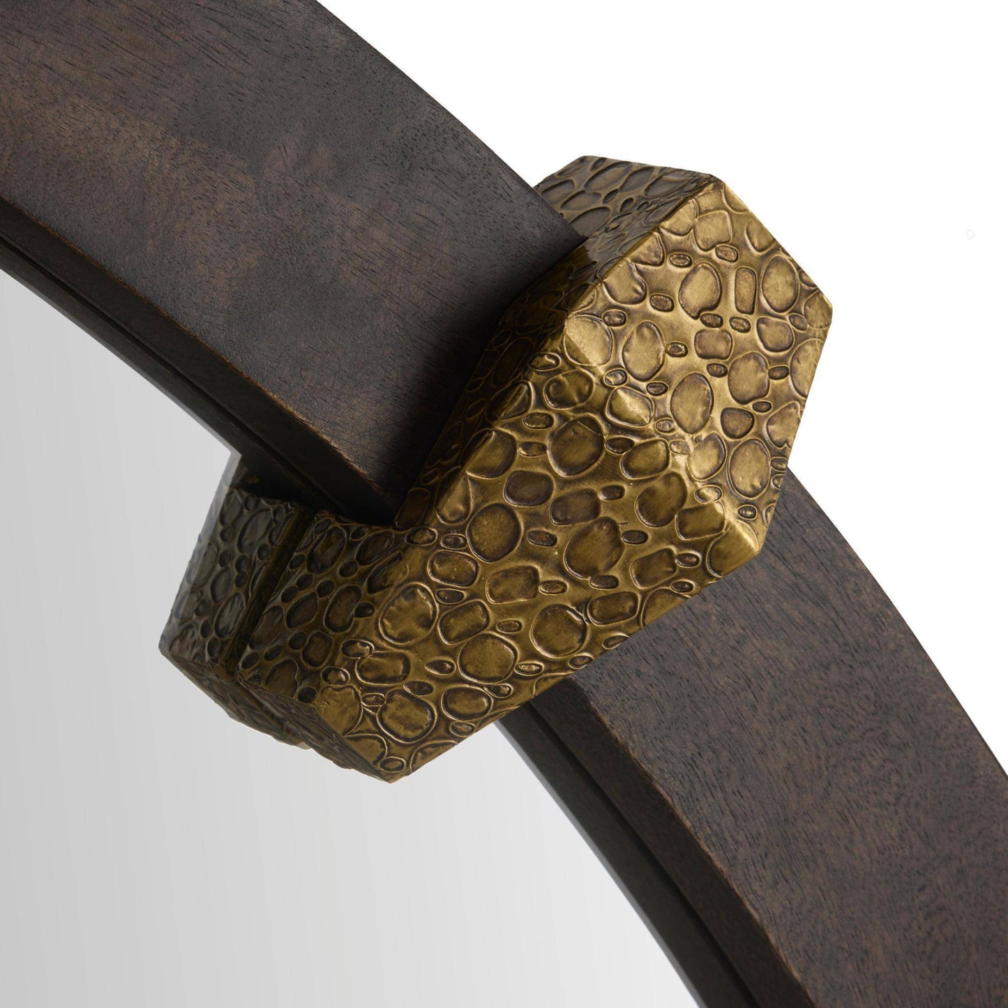 Close-up of a sword with a detailed hilt on a light gray background