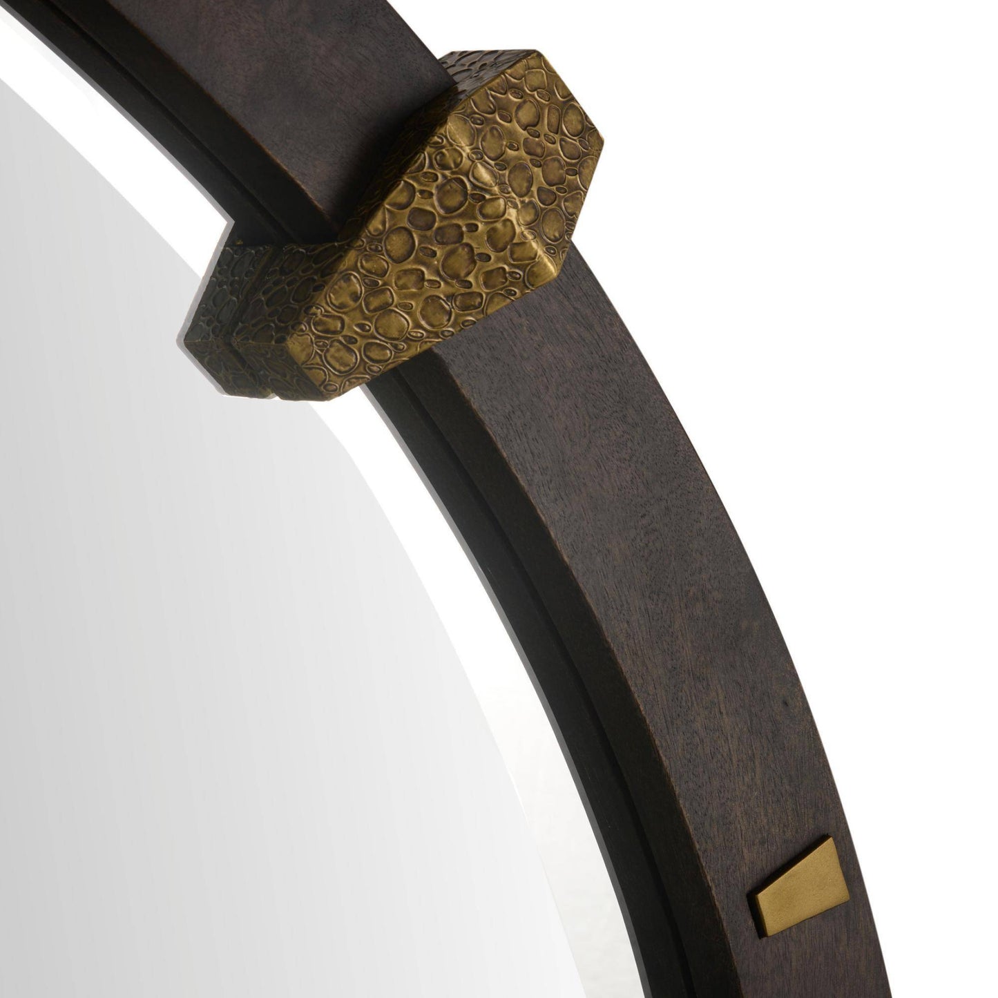 Close-up of a decorative mirror with a wooden frame and gold accent on a white background