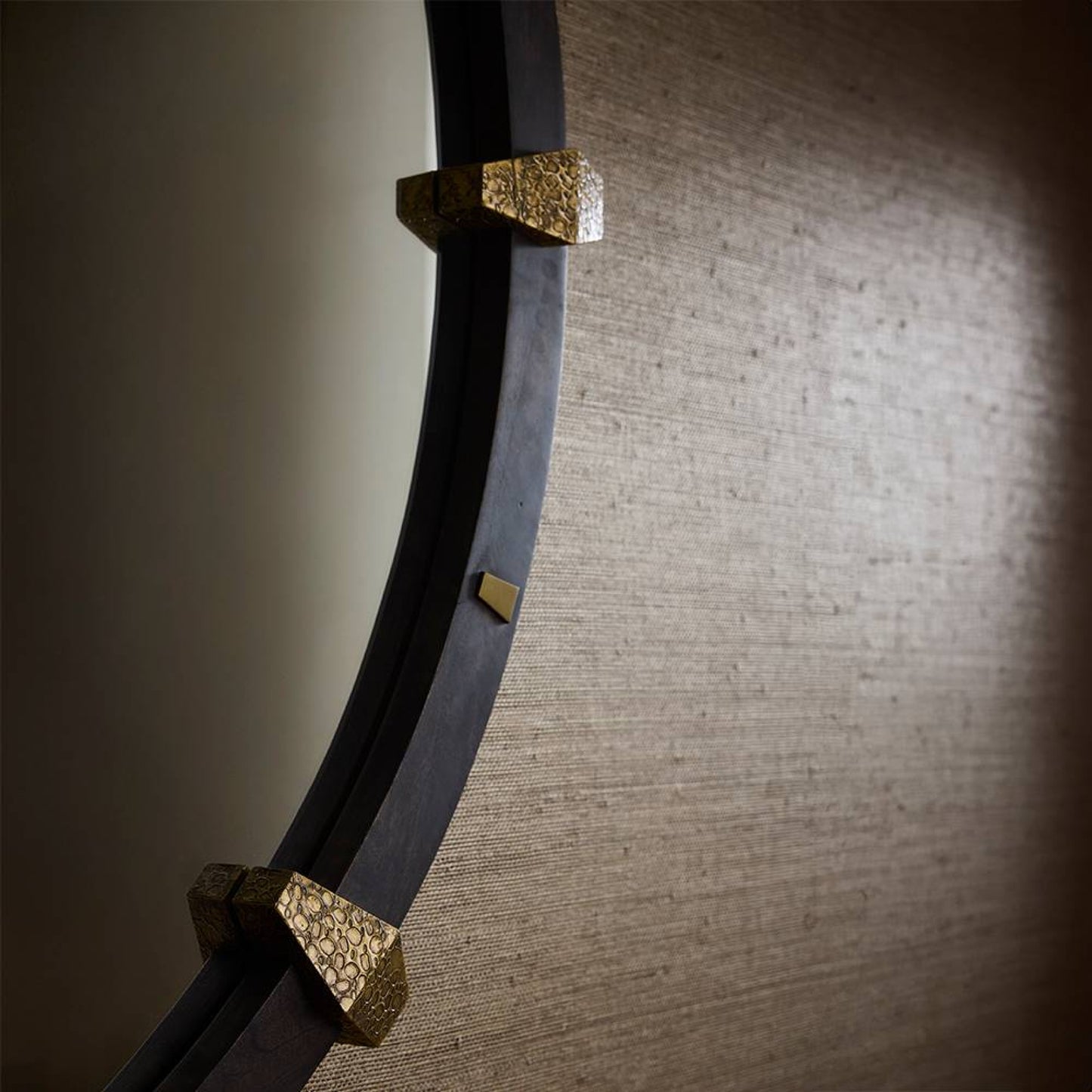 Sword with gold decorative elements on a textured wall background