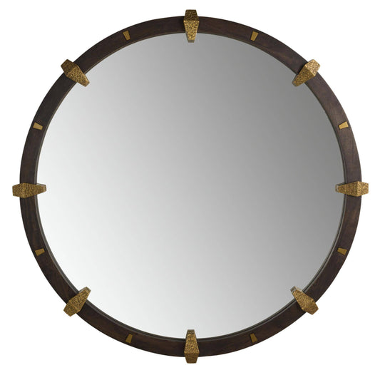 Round mirror with decorative brown frame and gold accents on a white background