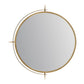 Round mirror with gold frame on a white background