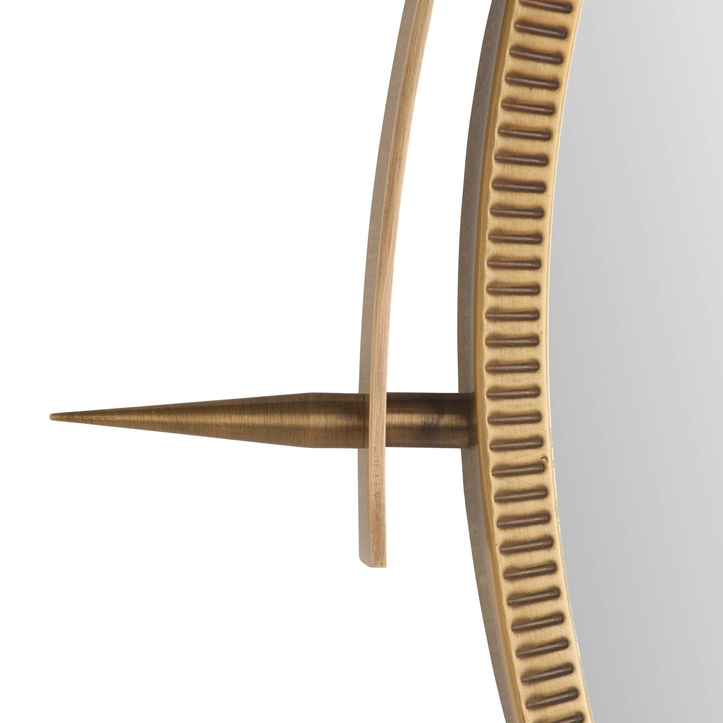 Decorative wall mirror with a textured gold frame on a white background