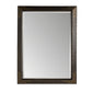 Rectangular mirror with a decorative brown frame on a white background