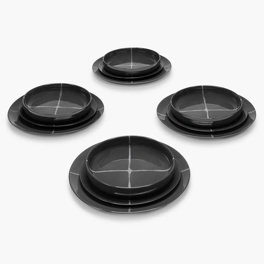 Set of black ceramic bowls on a white background