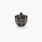 Ceramic sugar bowl with a checkered pattern on a white background