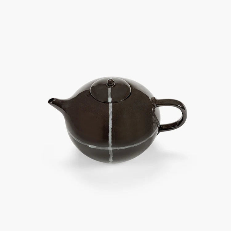 Black teapot with white stripe on a white background