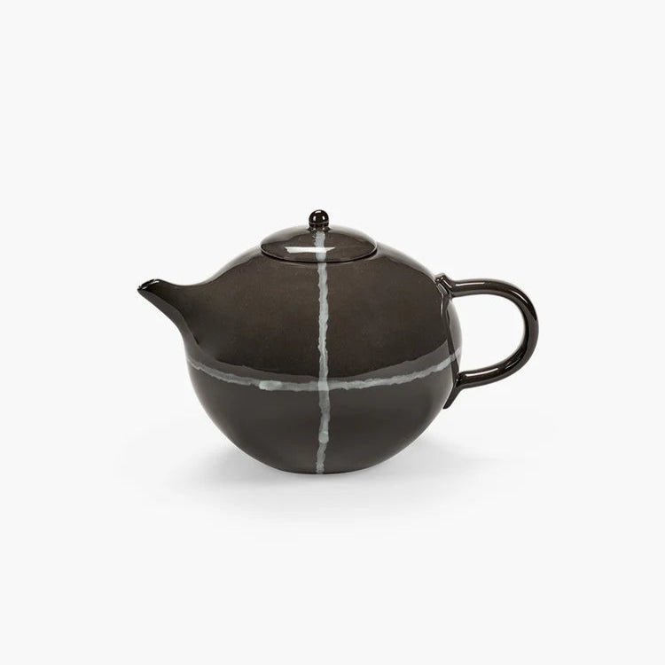 Black ceramic teapot with white stripe on a white background