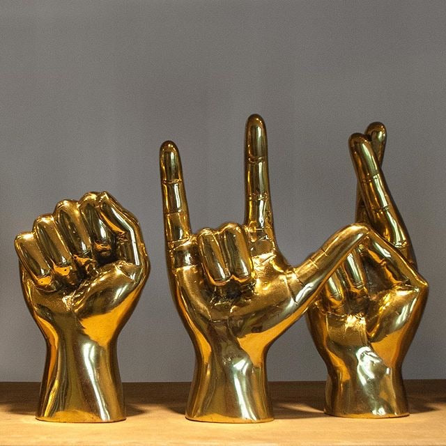 noir brass hand i love you sculpture shelving deocr
