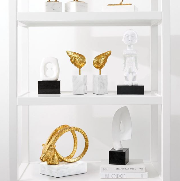 bungalow 5 wings statue bookends shelving showroom