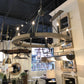Currey and company burgos chandelier round wood showroom