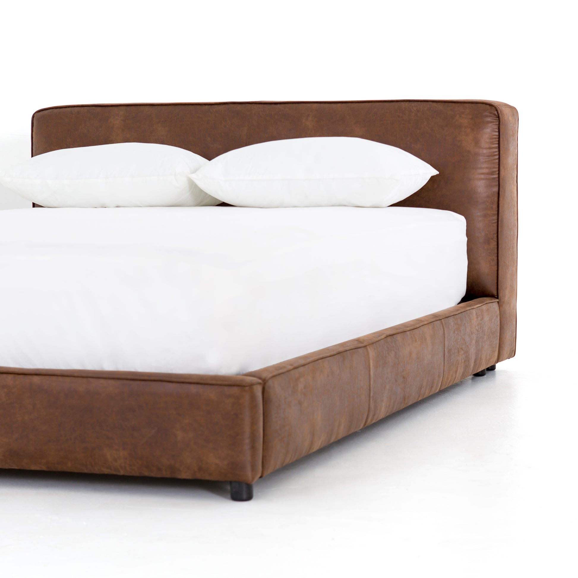 arteriors aidan bed vintage tobacco leather angle detail