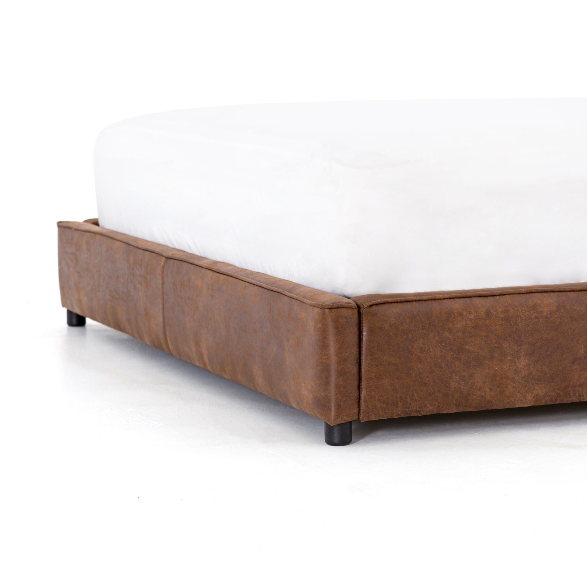 arteriors aidan bed vintage tobacco leather angle bottom detail