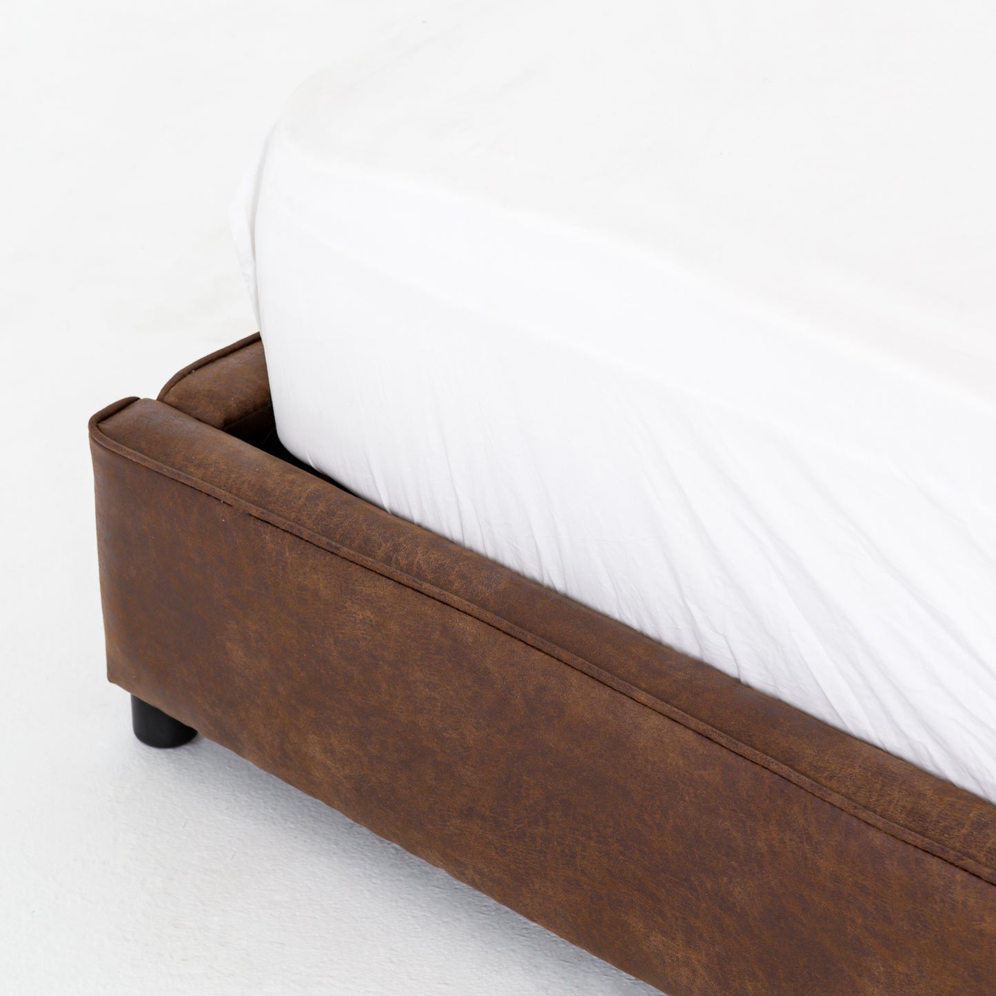 arteriors aidan bed vintage tobacco leather angle detail