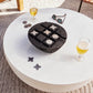 four hands basil outdoor coffee table matte white styled tabletop