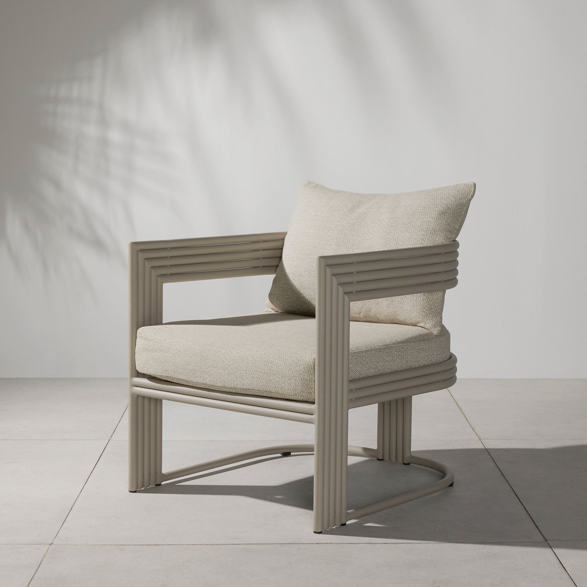 four hands lambert outdoor chair dove taupe styled