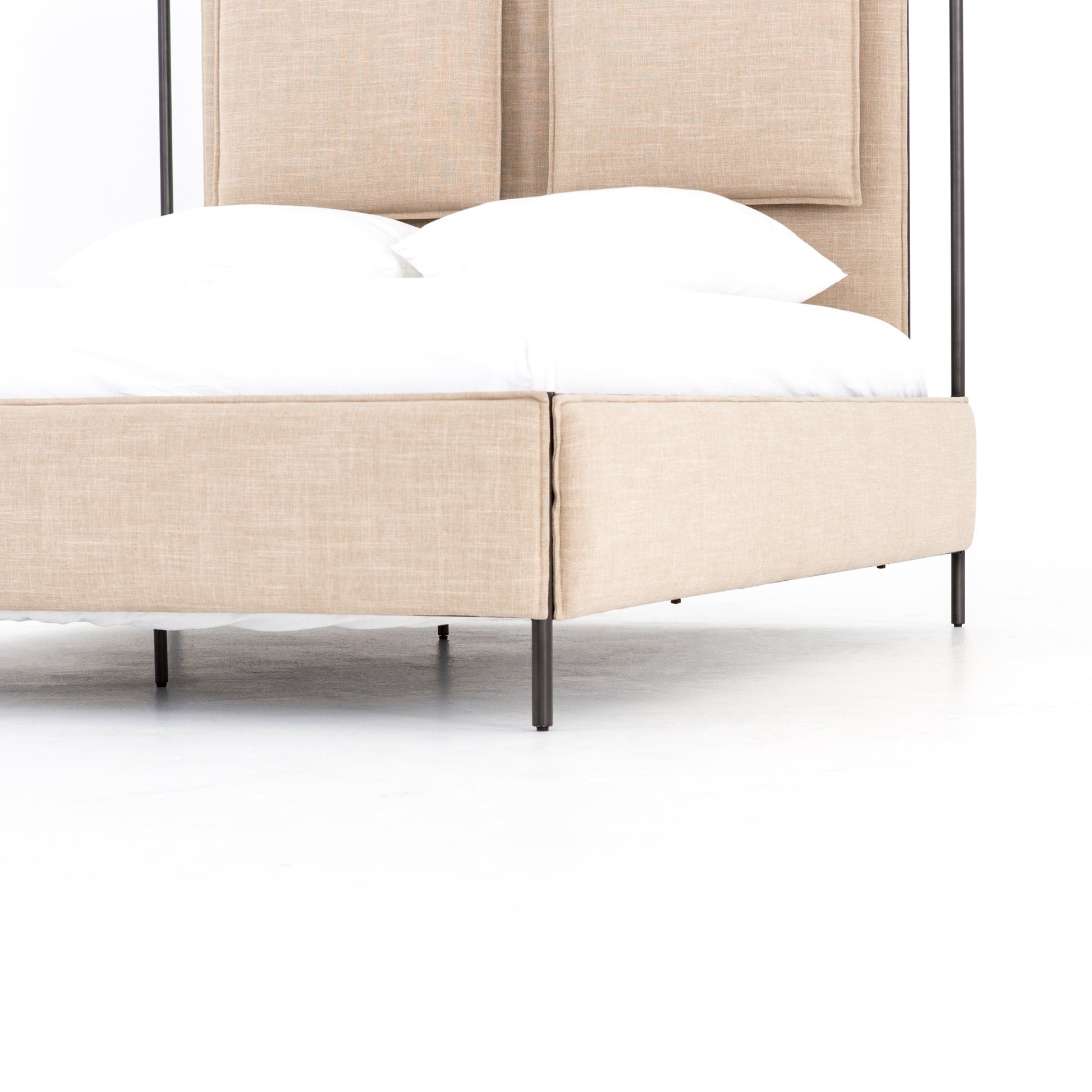 four hands leigh upholstered bed corner