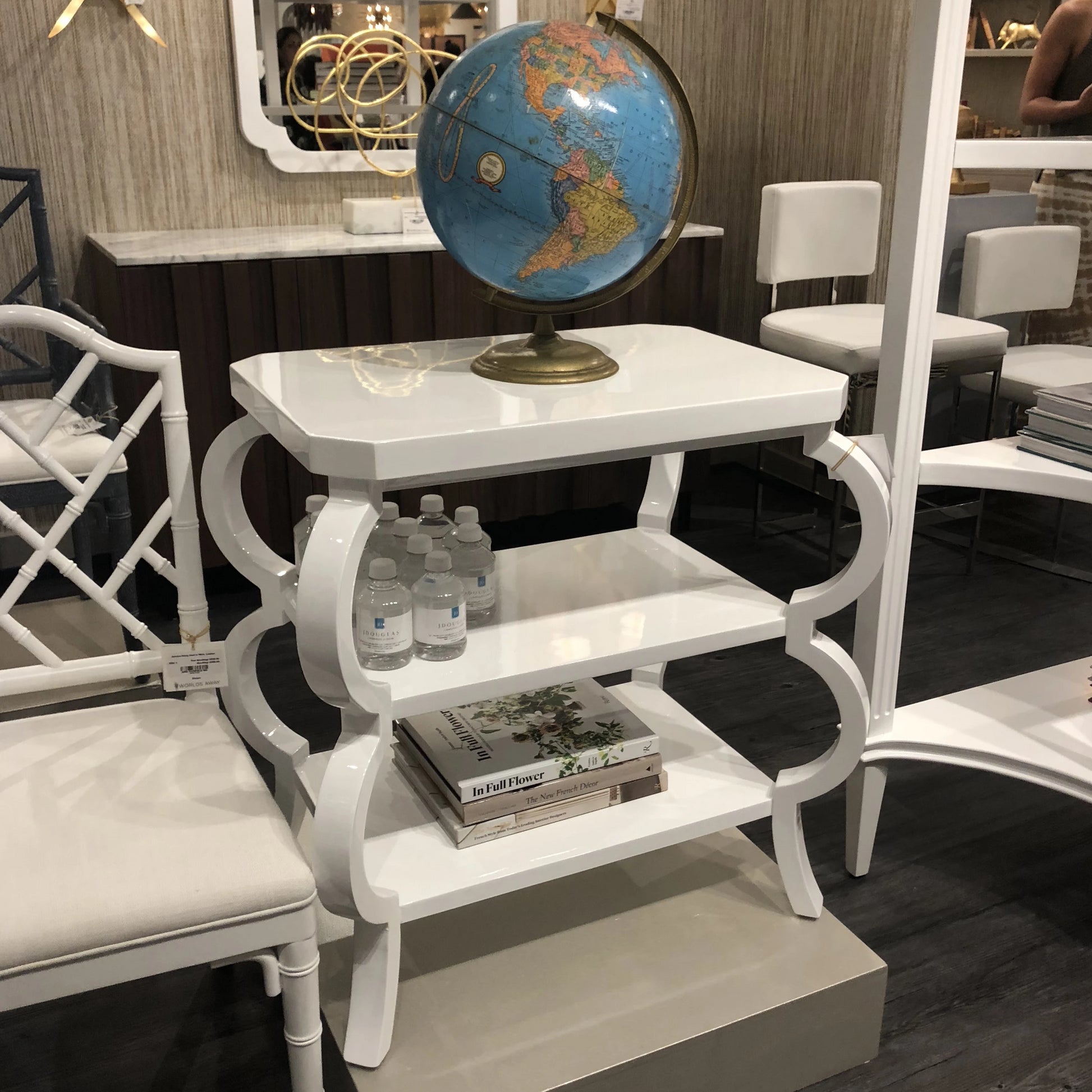 worlds away olive side table white showroom with chair