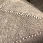 jamie young grey hide ottoman close up